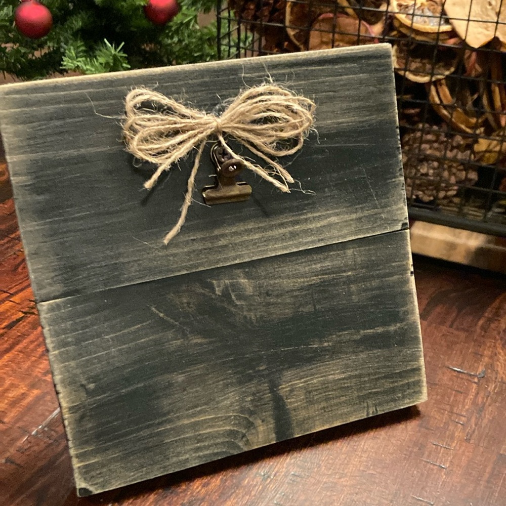 Black distressed wooden photo frame, approx 7”x7”.